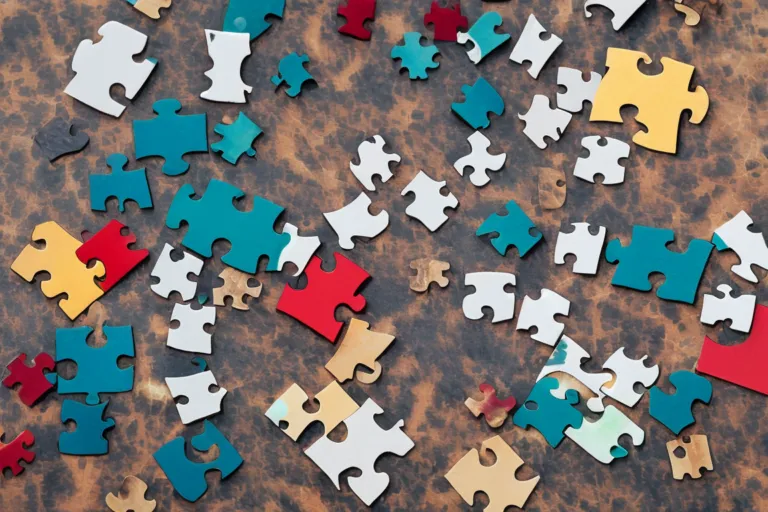 Puzzle pieced laid out over a cool background rock, representing strategic aggregate acquisitions.